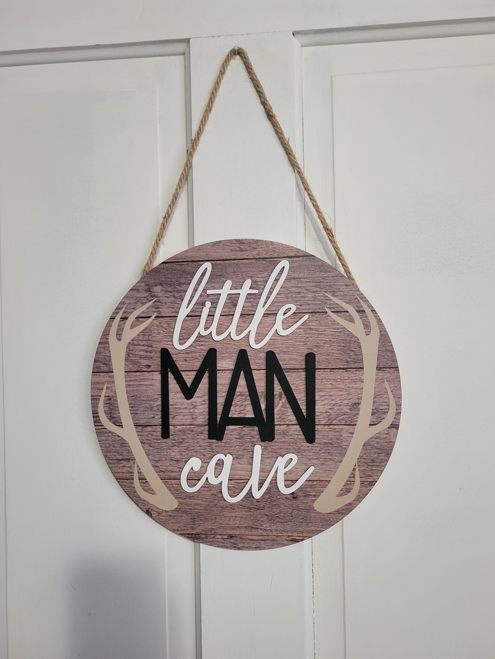 Ulu Little Man Cave Round Wood-Style Sign with Antler Accents